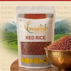 Premium Vedanna Red Rice ad featuring a white pouch, brass bowl of rice, and a misty terraced paddy field background with the tagline Savor the Grain, Taste the Heritage.