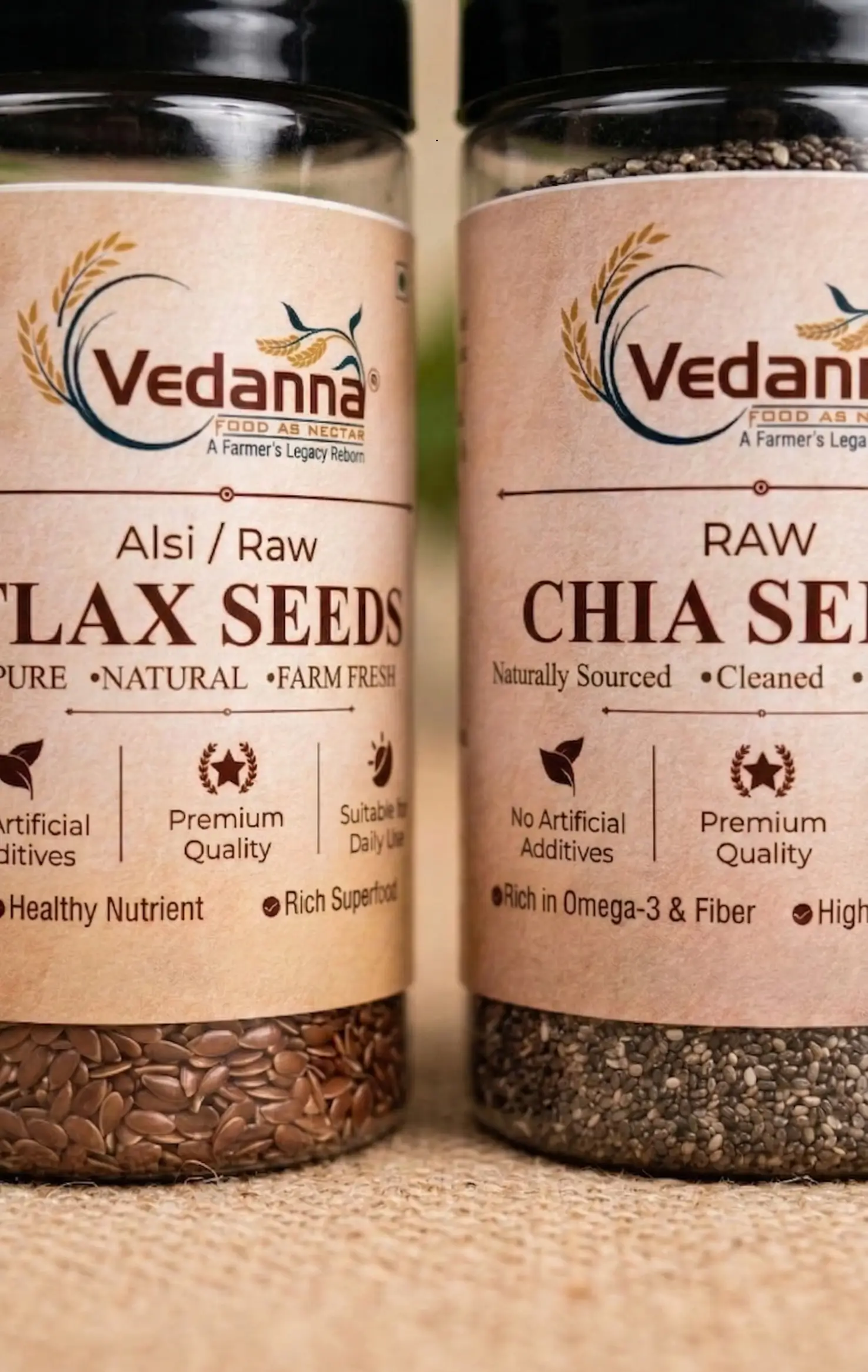 Extreme macro close-up of Vedanna Raw Chia Seeds and Alsi (Flax Seeds) in transparent jars, highlighting the clean, high-quality grain texture and heritage-style paper labeling.