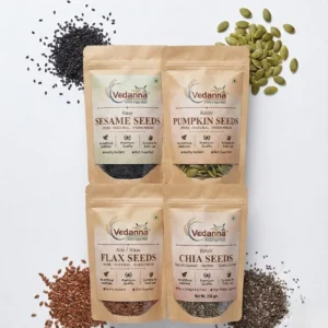 Vedanna 4-in-1 seed combo featuring chia, flax, pumpkin, and sesame seeds in transparent jars with black lids on a white background.