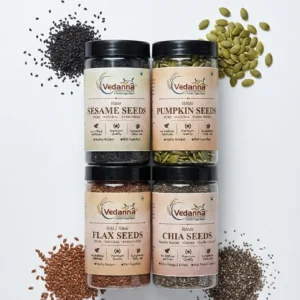Vedanna 4-in-1 seed combo featuring chia, flax, pumpkin, and sesame seeds in transparent jars with black lids on a white background.